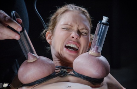 Busty MILF Rain Degrey suffers immensely while being masturbated in bondage