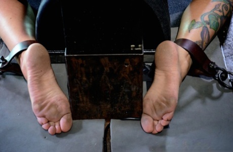 Naked redhead Rain DeGrey has tits & arms brutally bound for forced fellatio